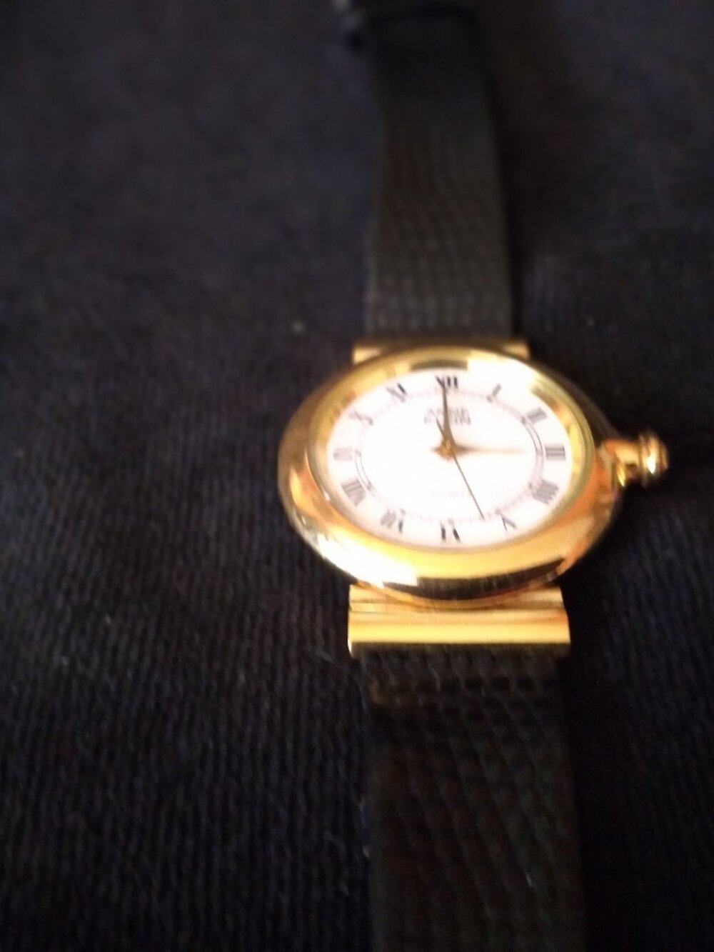 Attractive & Stylish Anne Klein Gold Tone Watch with Safire Blue Bezel